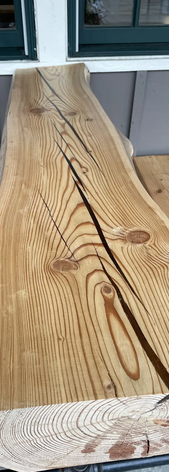 Restored log table at Neutral Ground Coffeehouse